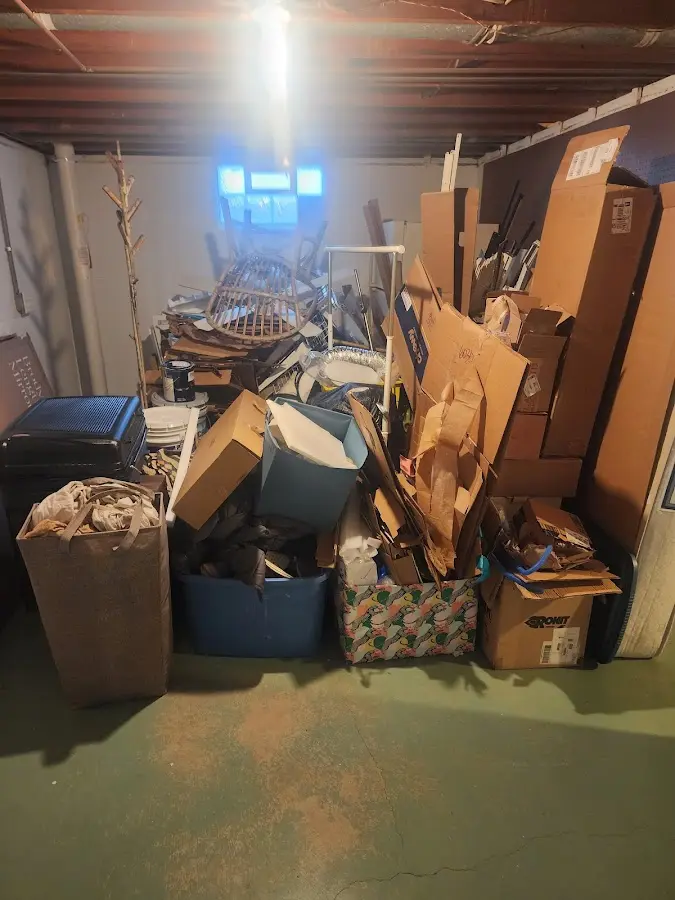 Roll-off dumpster container at job site for 6 Yard Dumpster Rental in Middle River